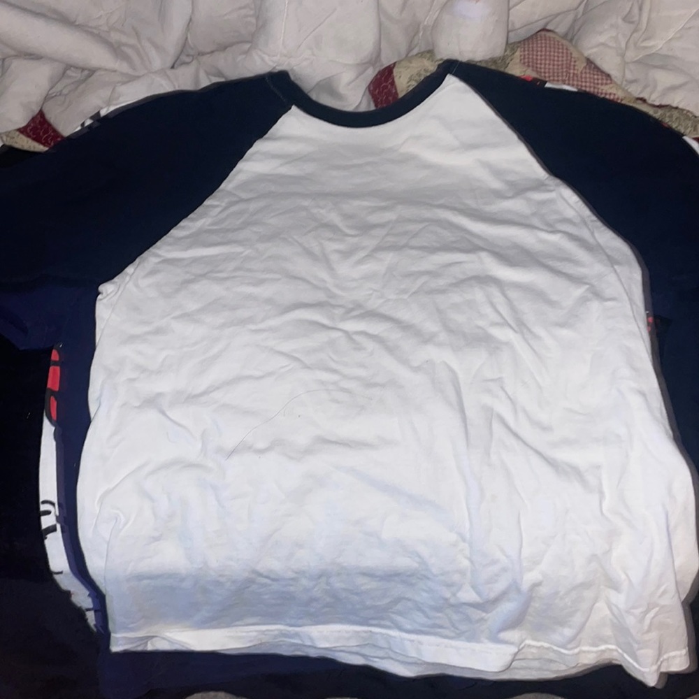 white shirt with dark blue long sleeves